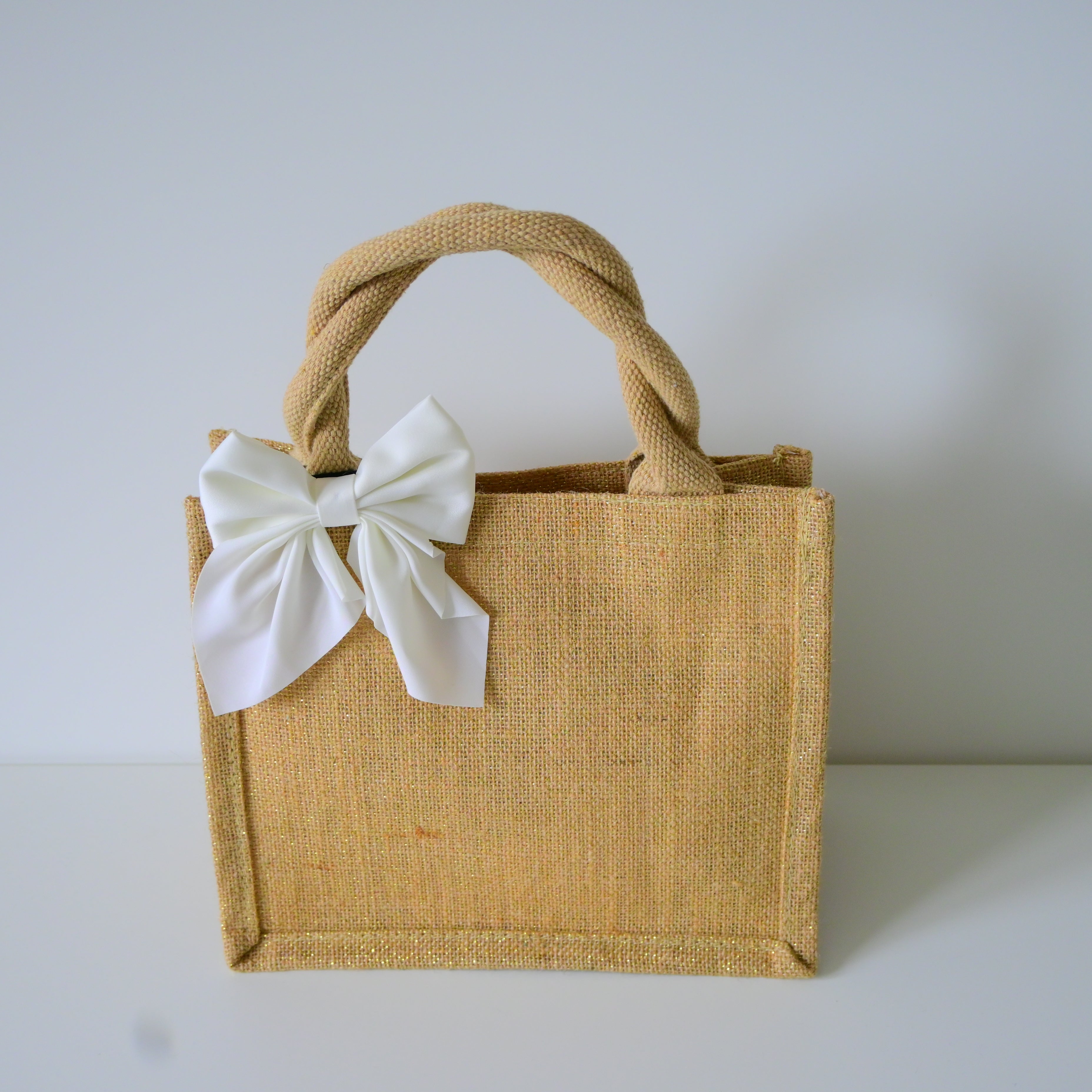 Jutena MINI shimmer torba s ukrasnom mašnom | Ručke u natural boji